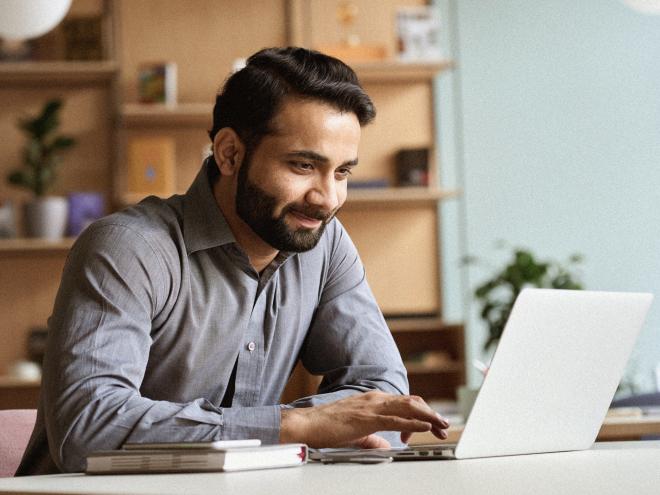 Person working on laptop.