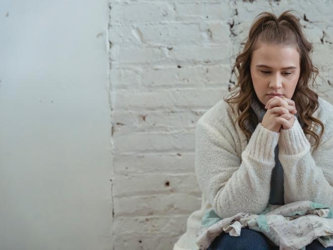 Young woman pondering  Young woman pondering