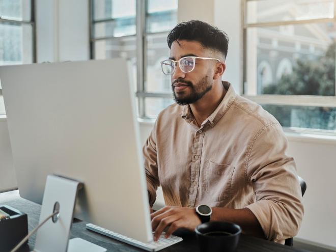 person_working_on_computer_at_desk.jpg person_working_on_computer_at_desk.jpg