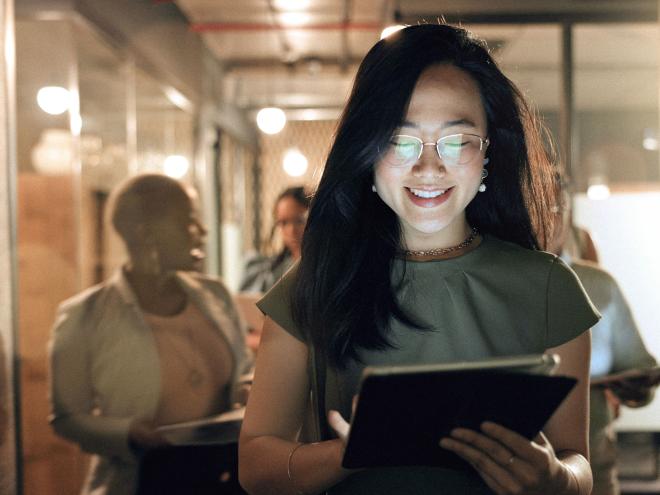 moa-privacy-course.jpg a health care worker looking at an iPad in an office